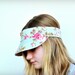Free Shipping in Australia- Pink linen and shabby chic blue and pink roses fabric Visor reversible and fits Small to medium size heads.