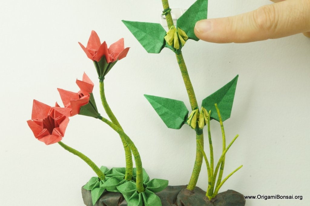 Origami Ikebana with Yellow and Red Flowers on Rock Outcropping