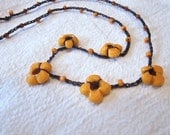 Orange Flower Chain beaded crocheted necklace on brown cord