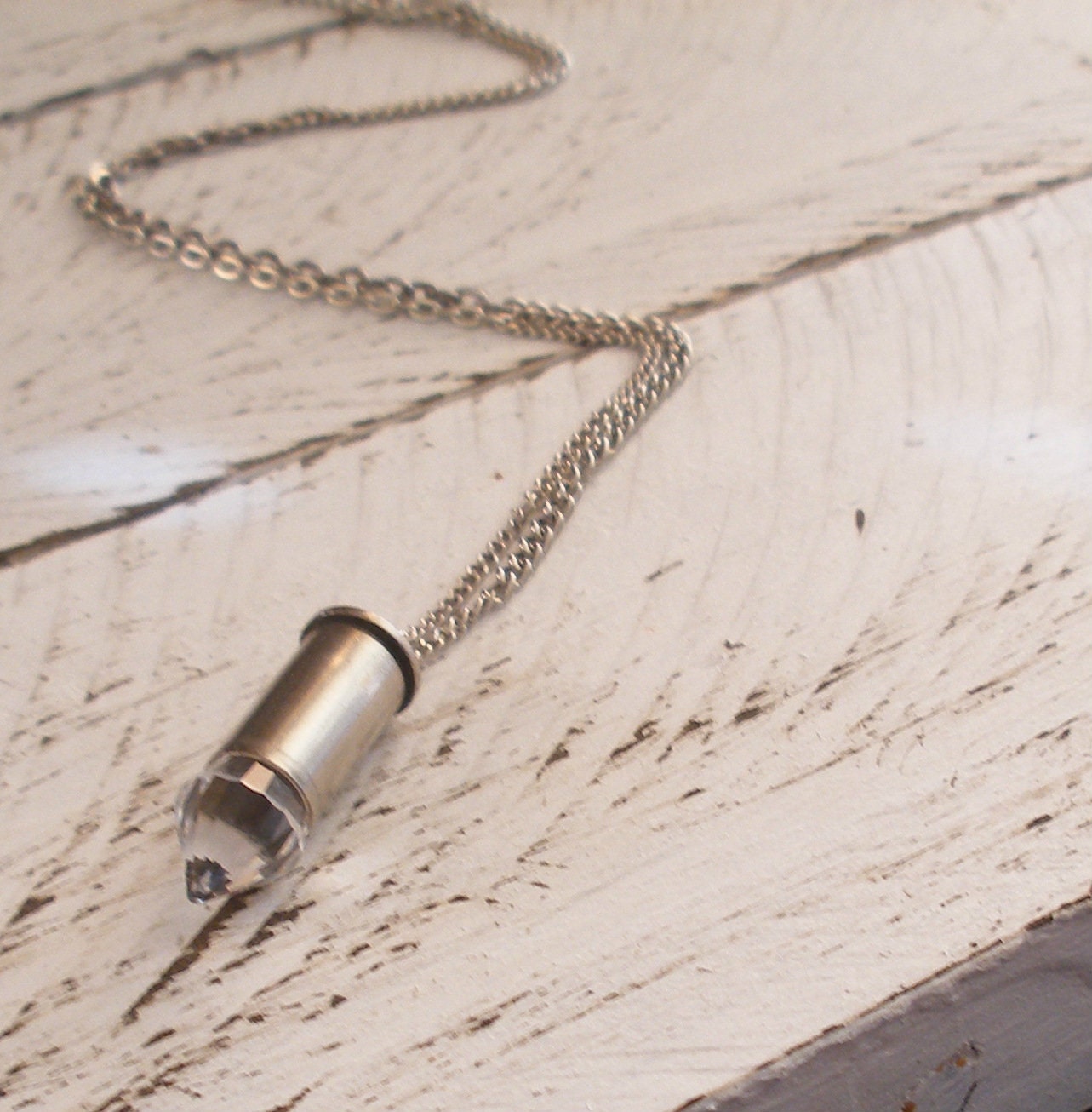 Upcycled bullet casing and small chandelier crystal necklace