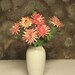 miniature mums in vase