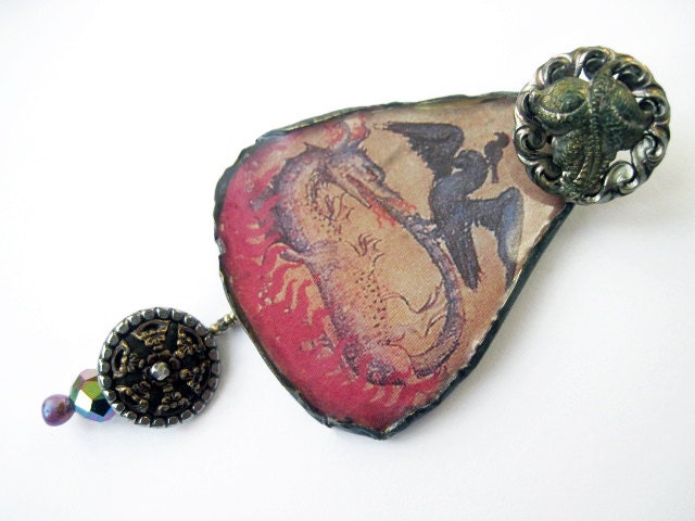 The Gift of Transmutation. Cosmic alchemy resin pendant with Victorian cut steel shank buttons.