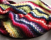 crocheted blanket, afghan, diagonal multicolor stripes, rainbow stripes,