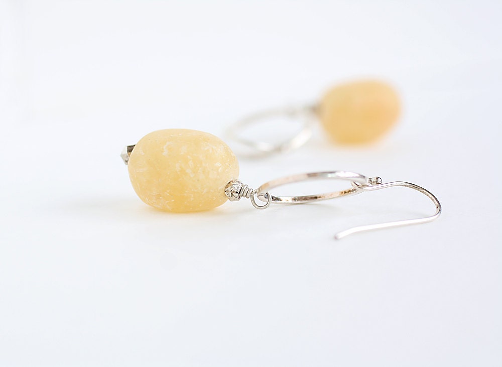 Dangly earrings of honey jade and sterling