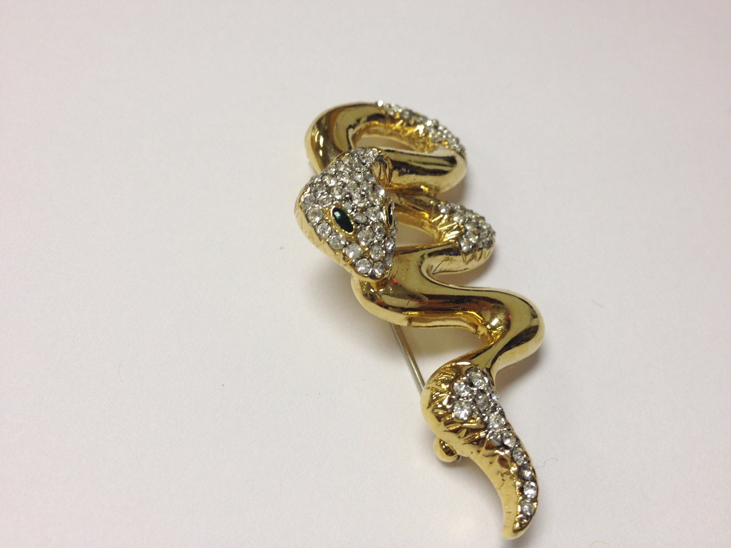 Beautiful vintage 80s gold tone and rhinestone snake brooch