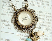 Faith.  Antique Brass Inspiration Charm Necklace.  Turquoise and cream beaded with bird charm.