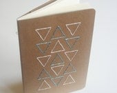 neon blue and white triangles stitched large moleskine, plain paper
