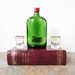 vintage travel bar / hollow book safe with flask and shot glasses