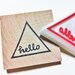 hello hand carved rubber stamp. handmade rubber stamp. geometric. mounted.