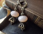Lovely Art Nouveau dangle earrings, opalescent pink glass and filigree