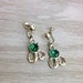 Vintage Silver Tone Metal Dangle Earrings with Green Rhinestones