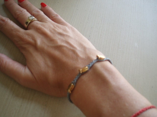 Blue bracelet fish luck charm gold cameo sea talisman white button by RedBracelet on Etsy