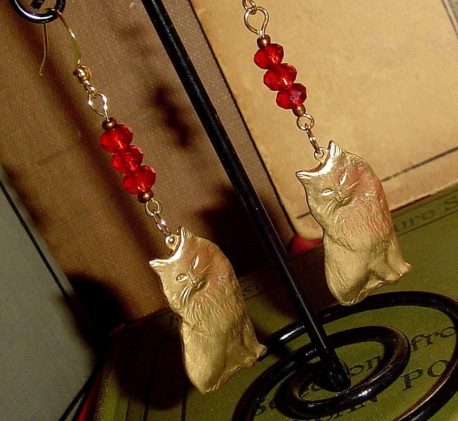 Brass cat earrings with bright red crystals handmade by MAB