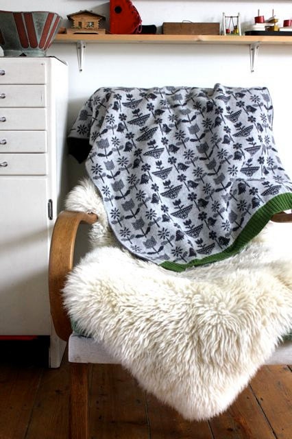 Lambswool flowers and birds cot blanket