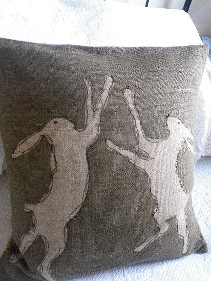 hand printed olive rustic boxing hare cushion cover
