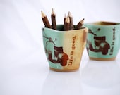 Mug with scooter 70's retro in golden brown and mint