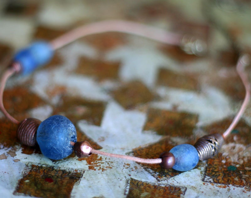 Blue glass and brass necklace
