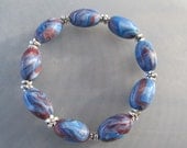 7 inch Stretch Bracelet - Handmade Polymer Clay Beads - Blue & Brown with Small Pewter Daisies.