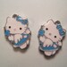 Pair of silver plated enameled kitty with wings charms
