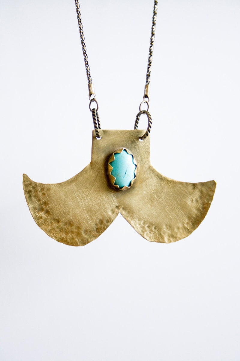 Metal work Viking inspired long fish tail pendant necklace with turquoise cabochon