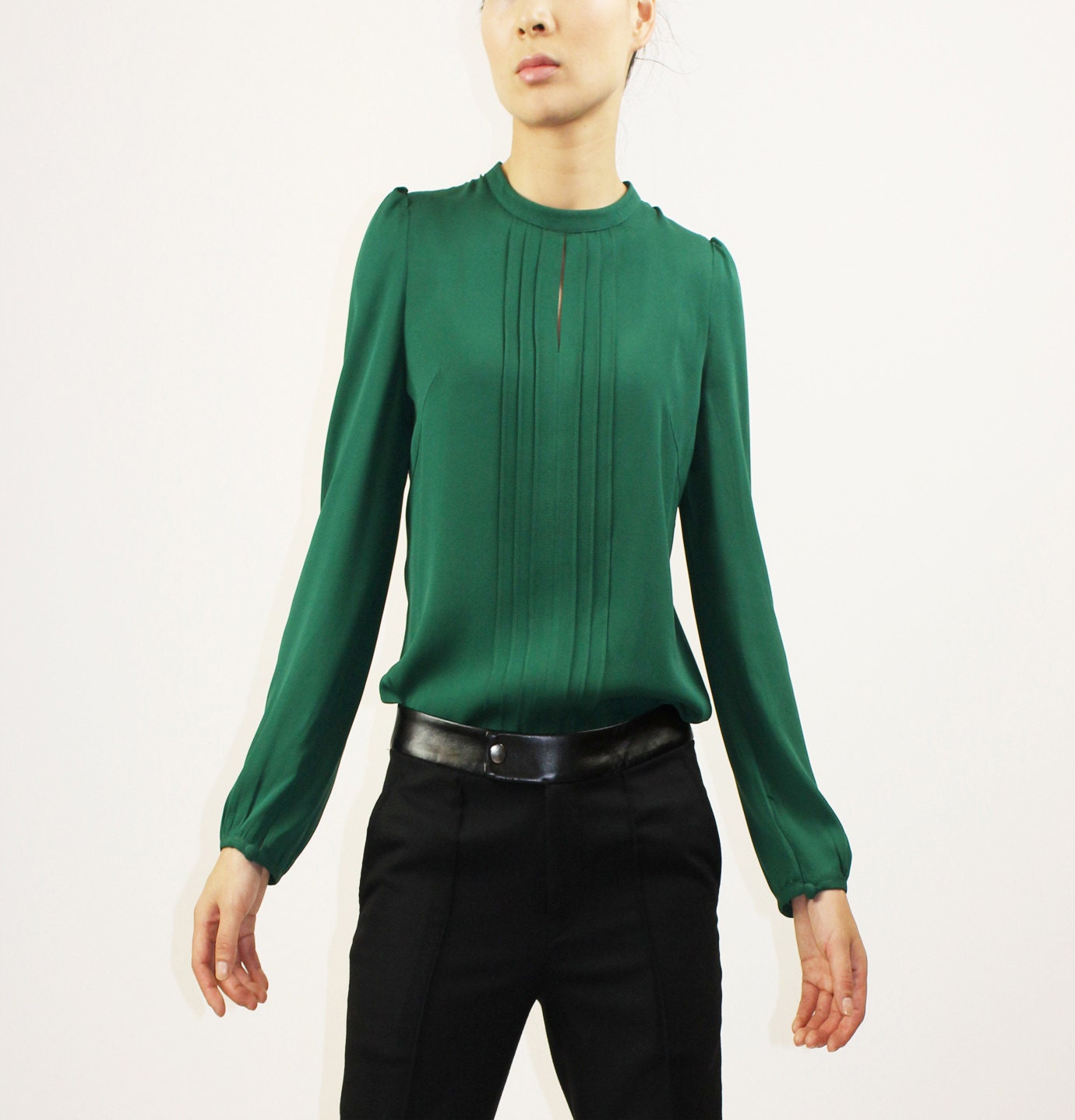 Green pleated silk blouse