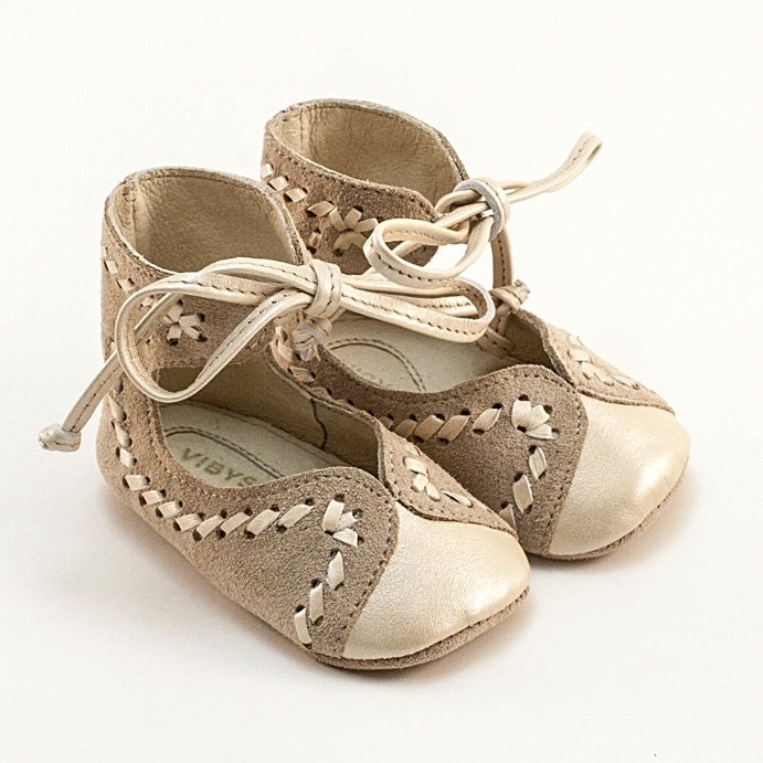 Baby shoes made from two toned beige leather