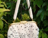 A vintage 1950s1960s cream and black beaded reversible handbag purse