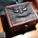 Monster Box: green eyed monster face on wooden box