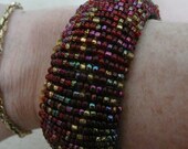 Handmade Iridescent Red Seed Beaded Cuff Bracelet