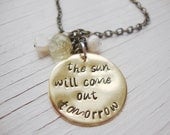 The sun will come out tomorrow brass hand stamped necklace with freshwater pearls and faceted quartz