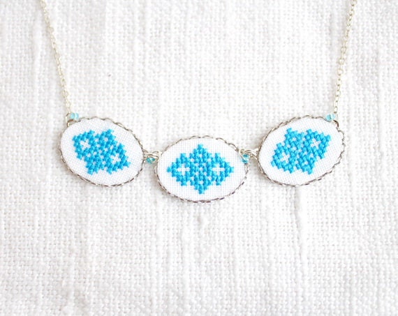 Hand embroidered necklace with three blue Ukrainian ornament in silvertone