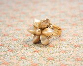 Ring repurposed vintage. Gold tone and adjustable.  Beautiful and one of a kind.