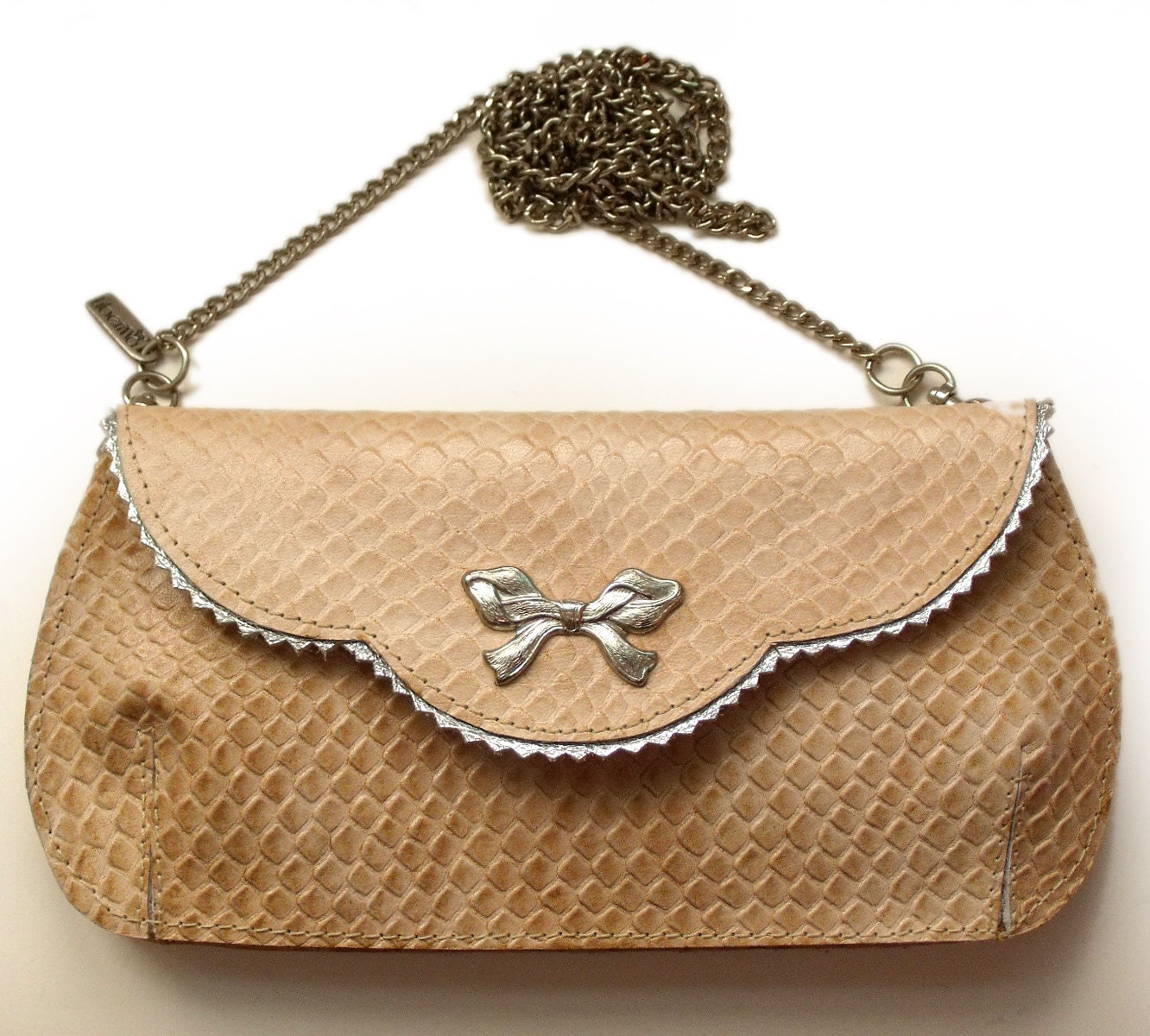 Holiday Sale - Gorgeous nude leather clutch with a silver bowtie