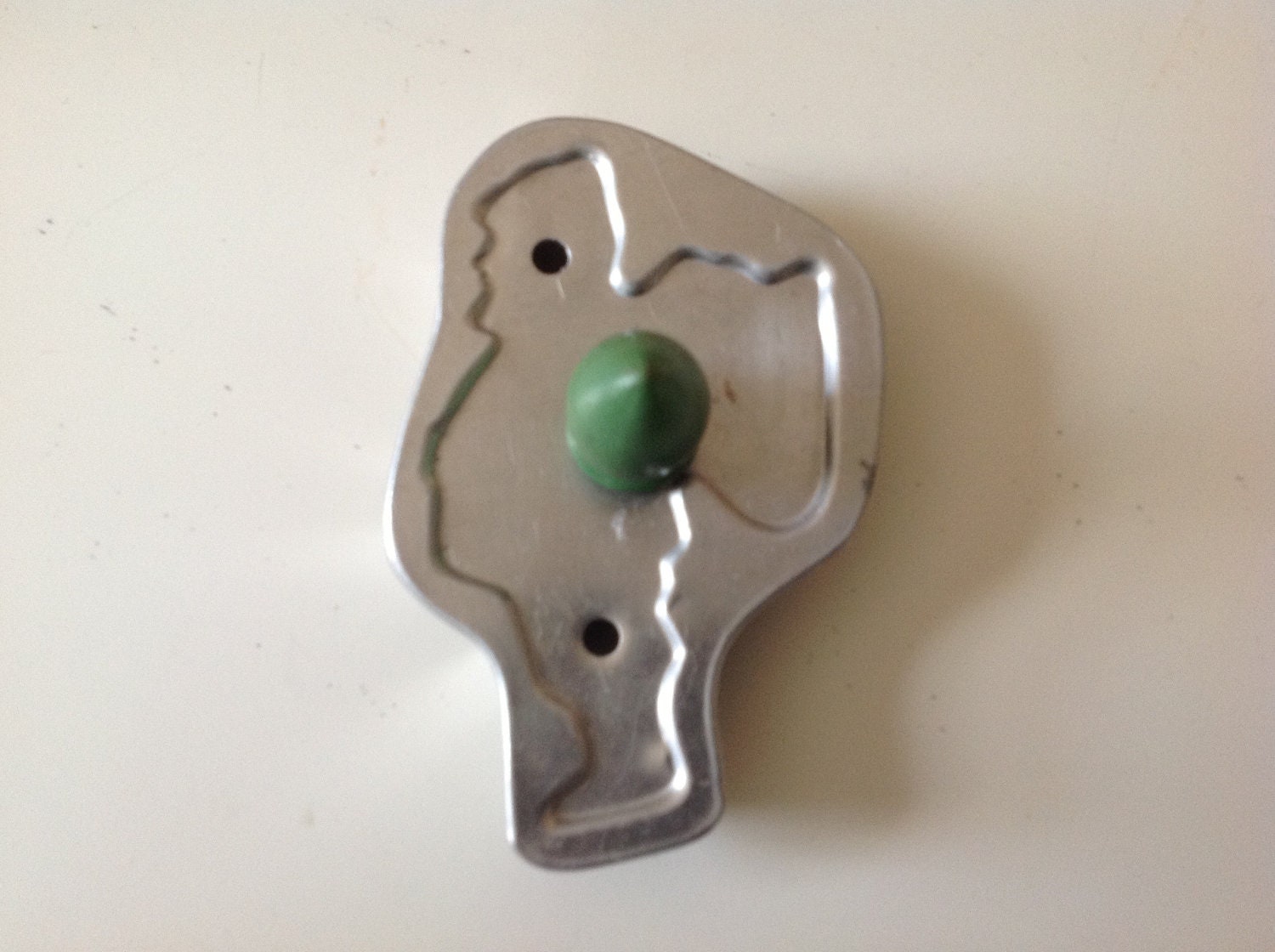 Santa cookie cutter with green Handle