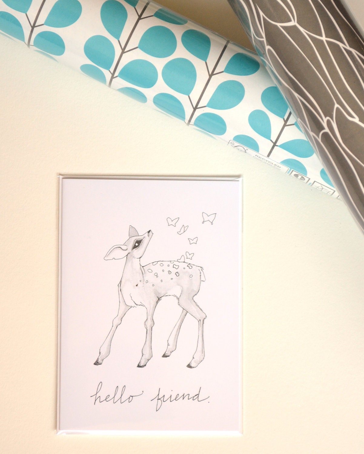 greeting card: calf deer and butterfly spots, hello friend.