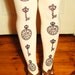 Alice in Wonderland Printed Tights Pocket-Watch Keys Small Medium Black on Cream Womens