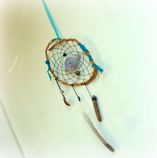Baby crib mobile - spiritual journey mandala dream catcher weaved in blue with unique ceramic bead and carved avocado pit