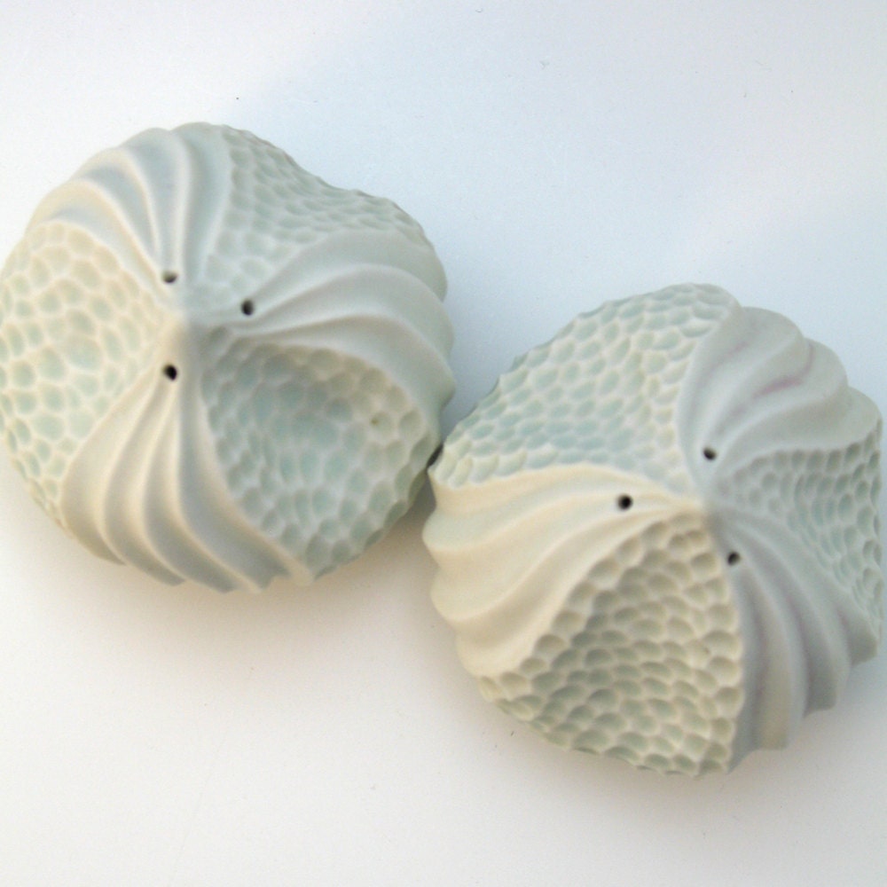 Carved porcelain salt shaker set, sea urchin in white & aqua blue