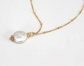 Dangling Karats Freshwater coin pearl  necklace in silver with delicate chain. Single pearl necklace with a satellite chain chain necklace