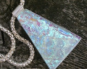 Dichroic glass in ethereal layers of cyan, greens and pinks in a triangle shape.....103PM