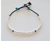 Sterling silver bracelet with nugget beads and turquoise