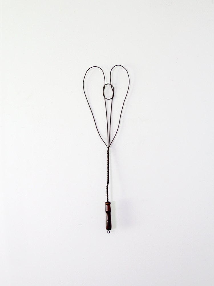 antique rug beater / primitive heart