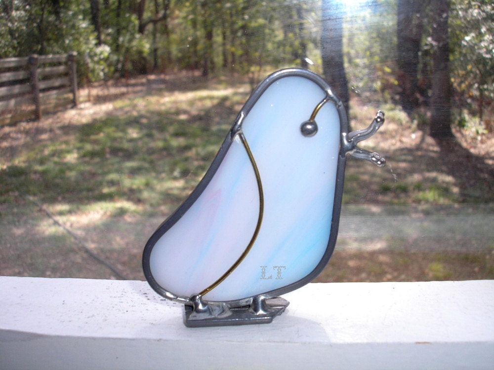 LT Stained glass Bird ornament freestanding made with streaked very light aqua green opal glass