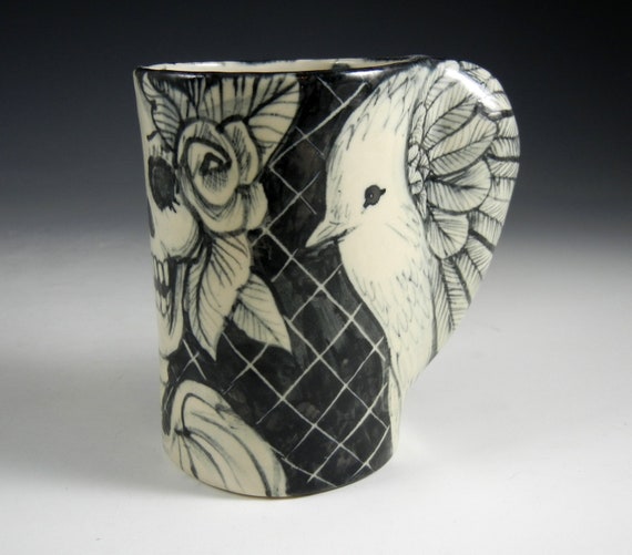 Black and white bird cup with skull and wings