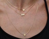 Skull Baby Necklace (available in gold & silver)