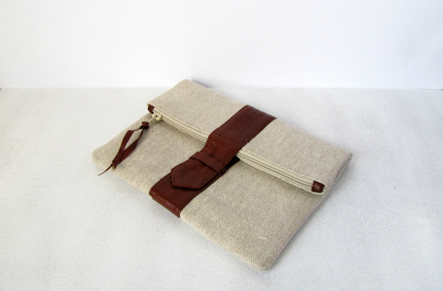 Fold over leather and canvas clutch brown Linen Fashion