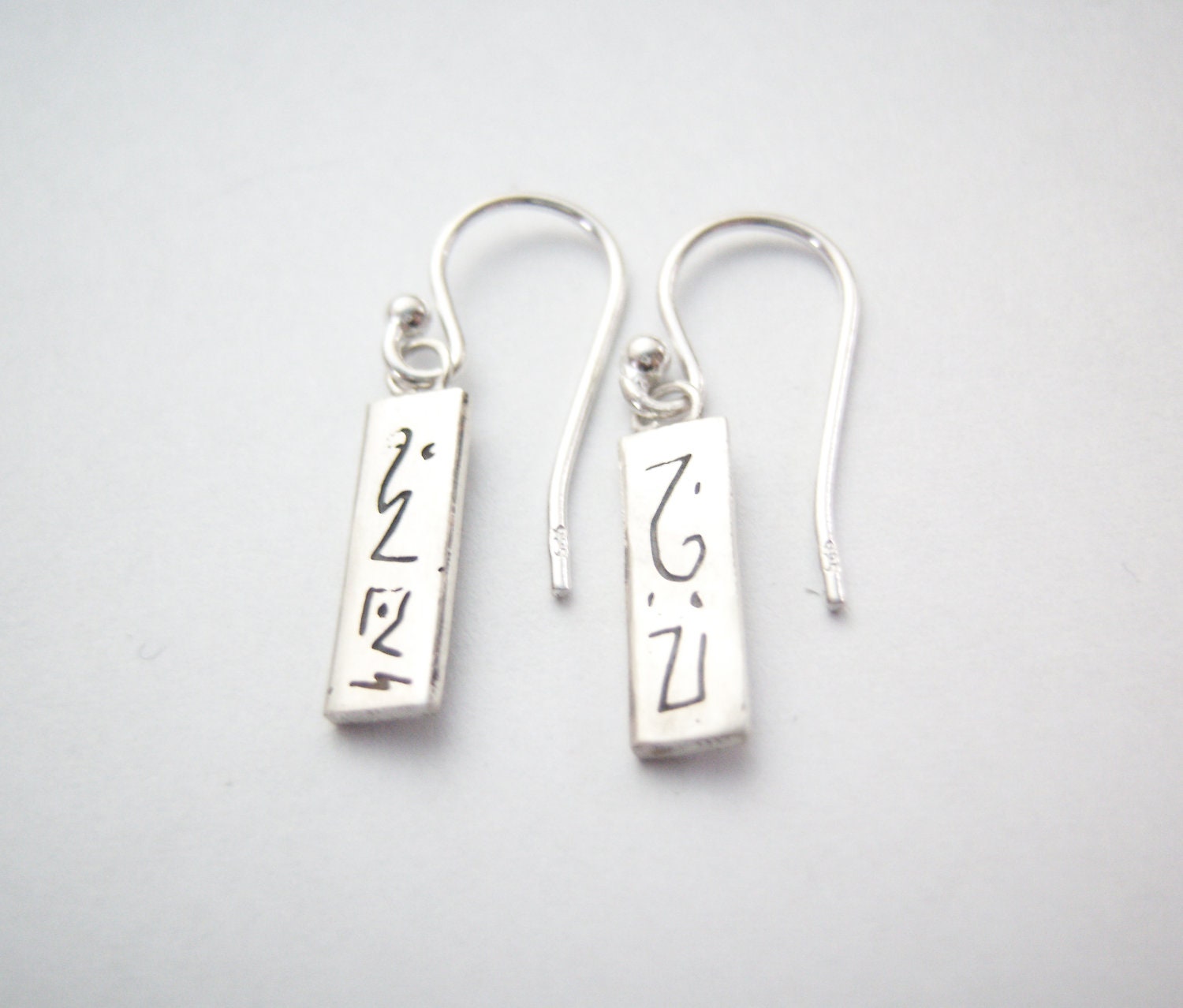 Avengers Thor Loki etched silver Loki double sided earrings