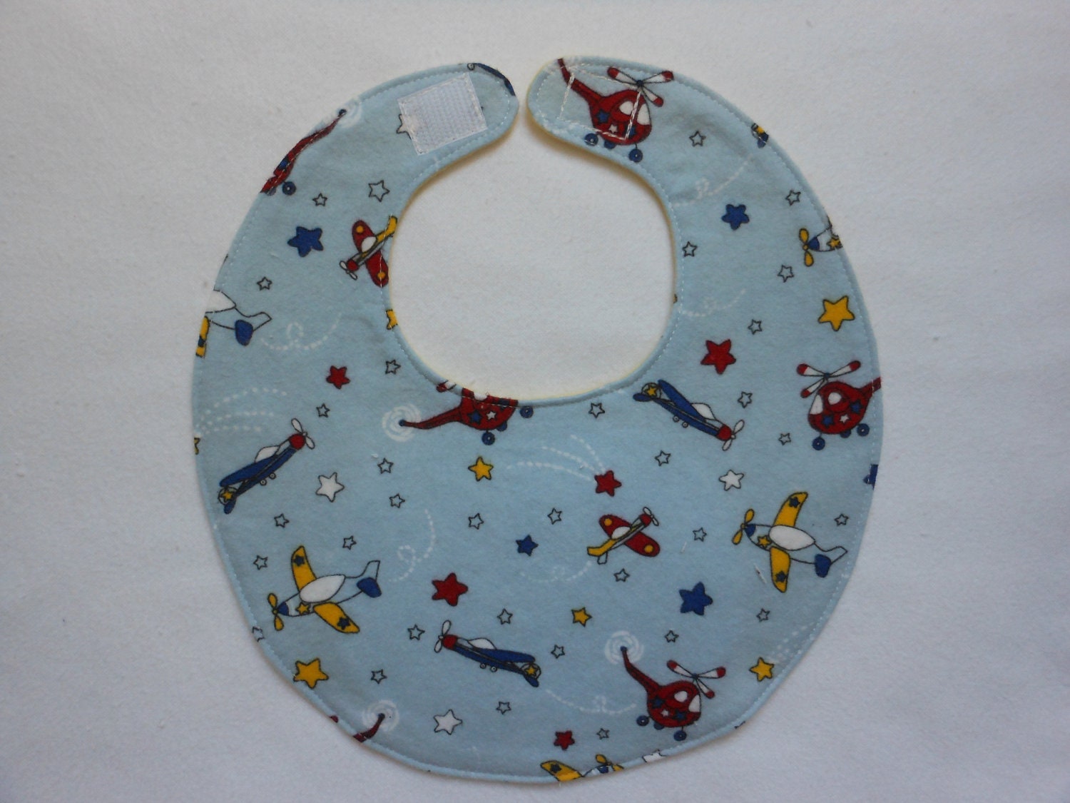 Baby Bibs, four soft layers, reversible, blue with red & yellow airplanes