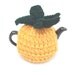 Pineapple handknitted tea cosy cozy to fit a medium 4-6 cup pot.