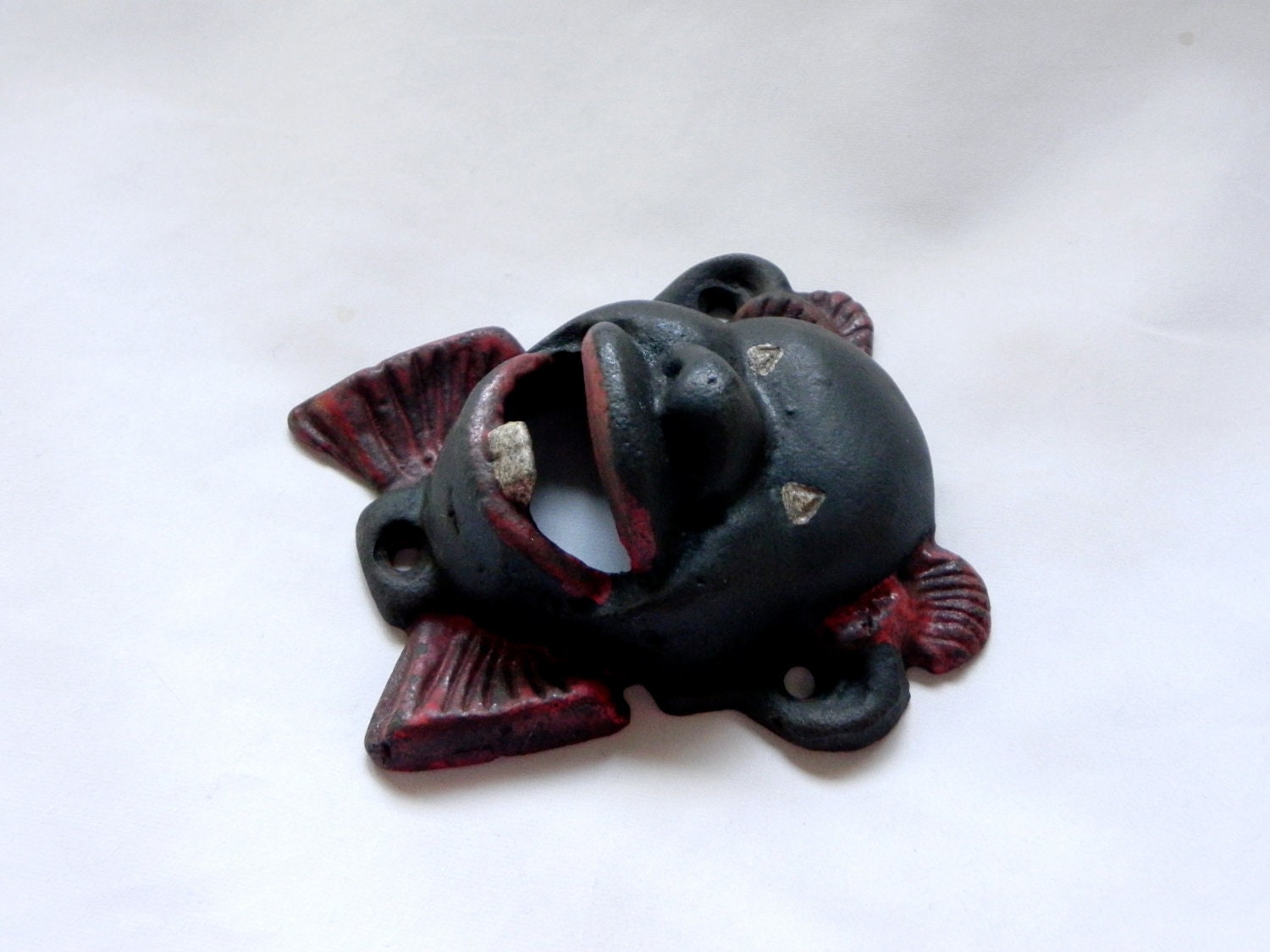 vintage cast iron bottle opener // black americana // wall hanging